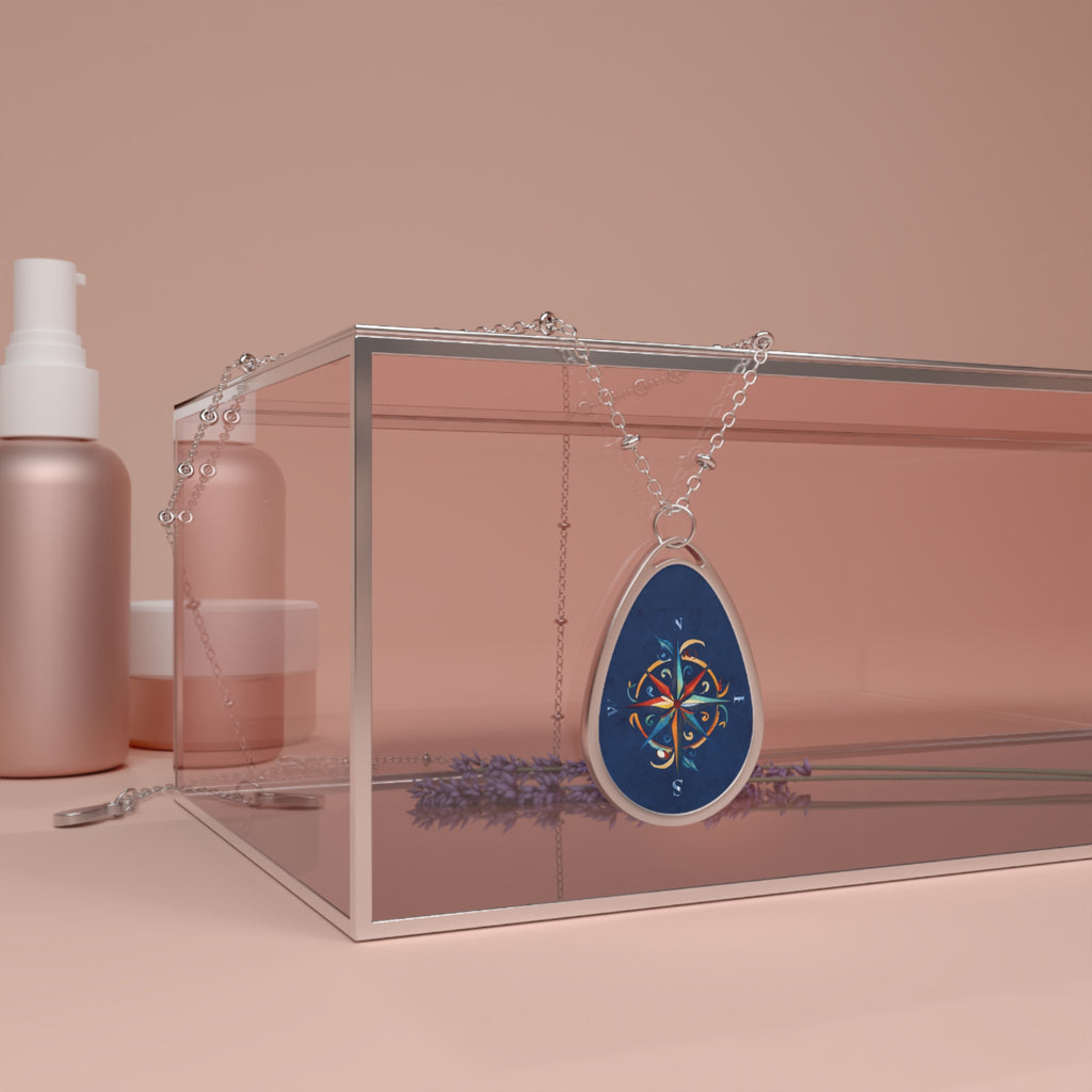 Windrose blue ellipse pendant | A delicate ellipse pendant that wears like a little secret