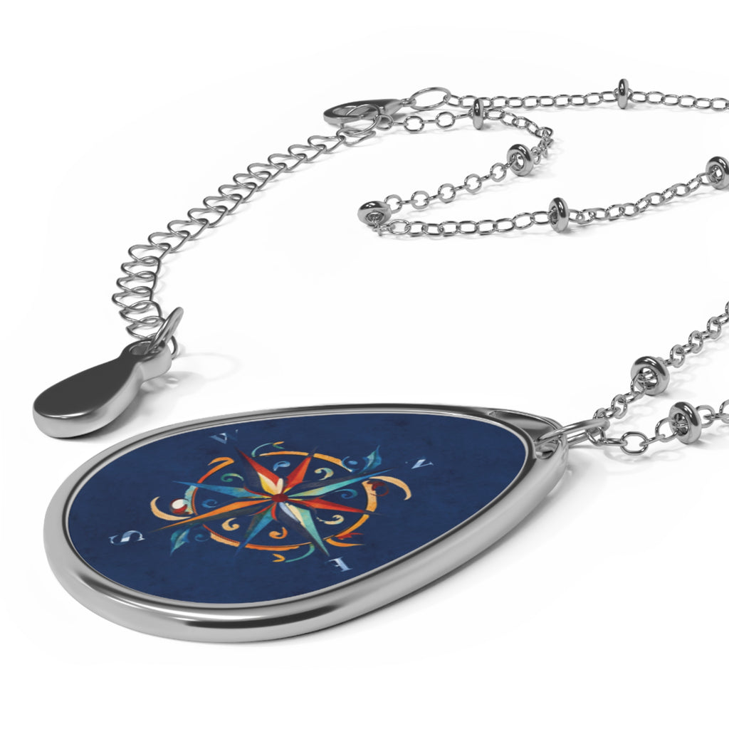 Windrose blue ellipse pendant | A delicate ellipse pendant that wears like a little secret