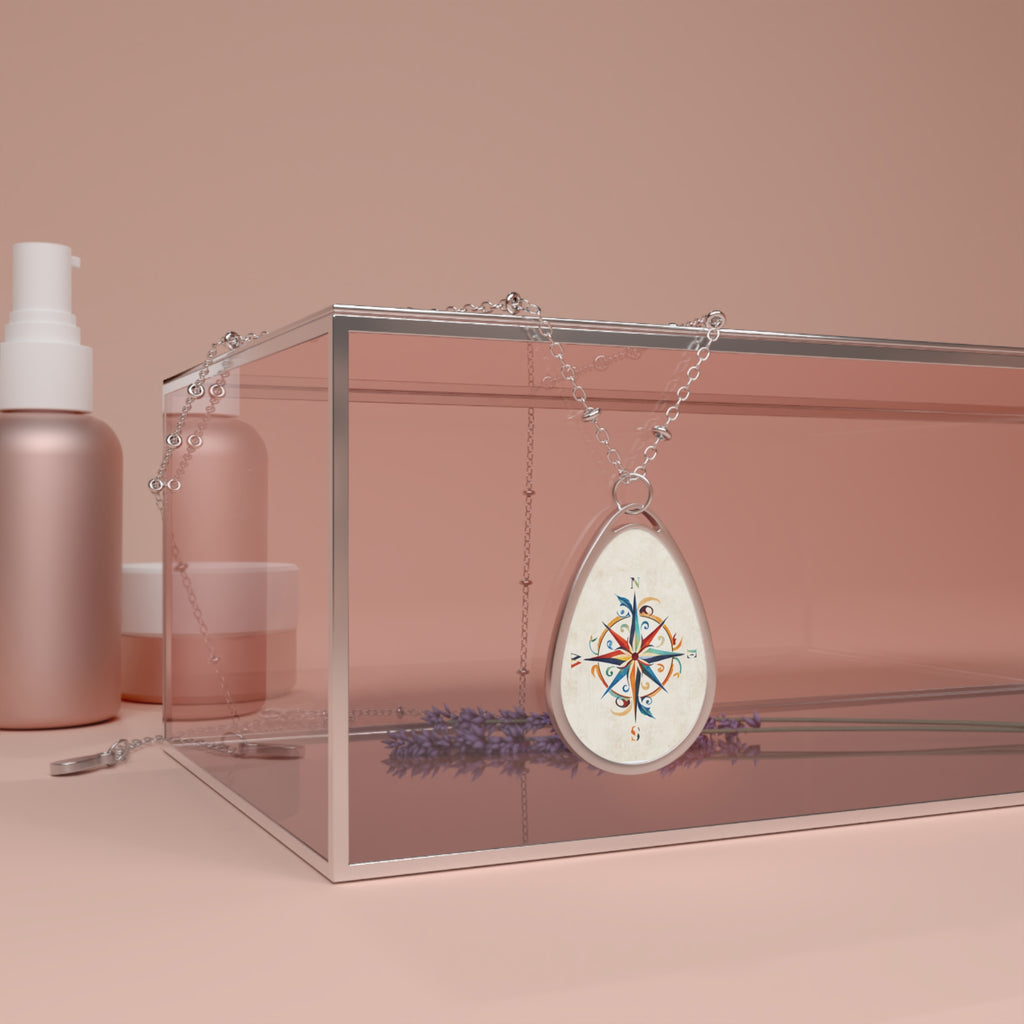Windrose white ellipse pendant | A delicate ellipse pendant that wears like a little secret